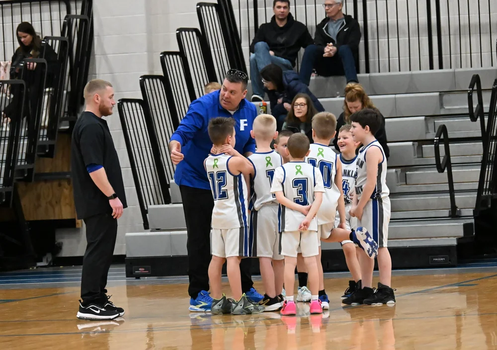 Franklin Cubs Boys Basketball Team Huddle