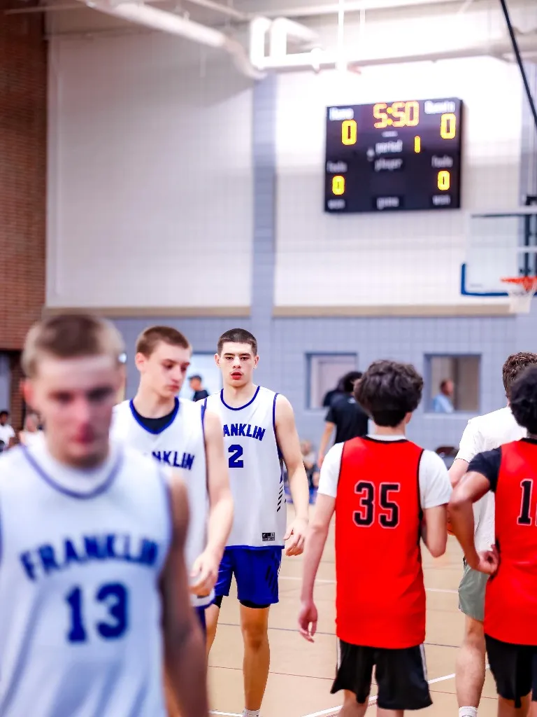 Varsity Boys Basketball Action - Team Play